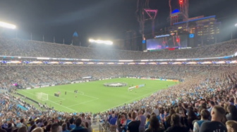 WATCH: Charlotte Soccer Fans Save National Anthem After Microphone Fails — and it was Epic! Screen-Shot-2022-03-05-at-9.31.48-PM-336x187